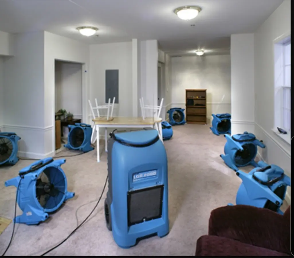 Air movers and dehumidifier setup for Water Damage Restoration in Suwanee
